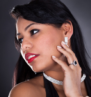 Portrait Of Young Beautiful Woman Isolated Over Black Background